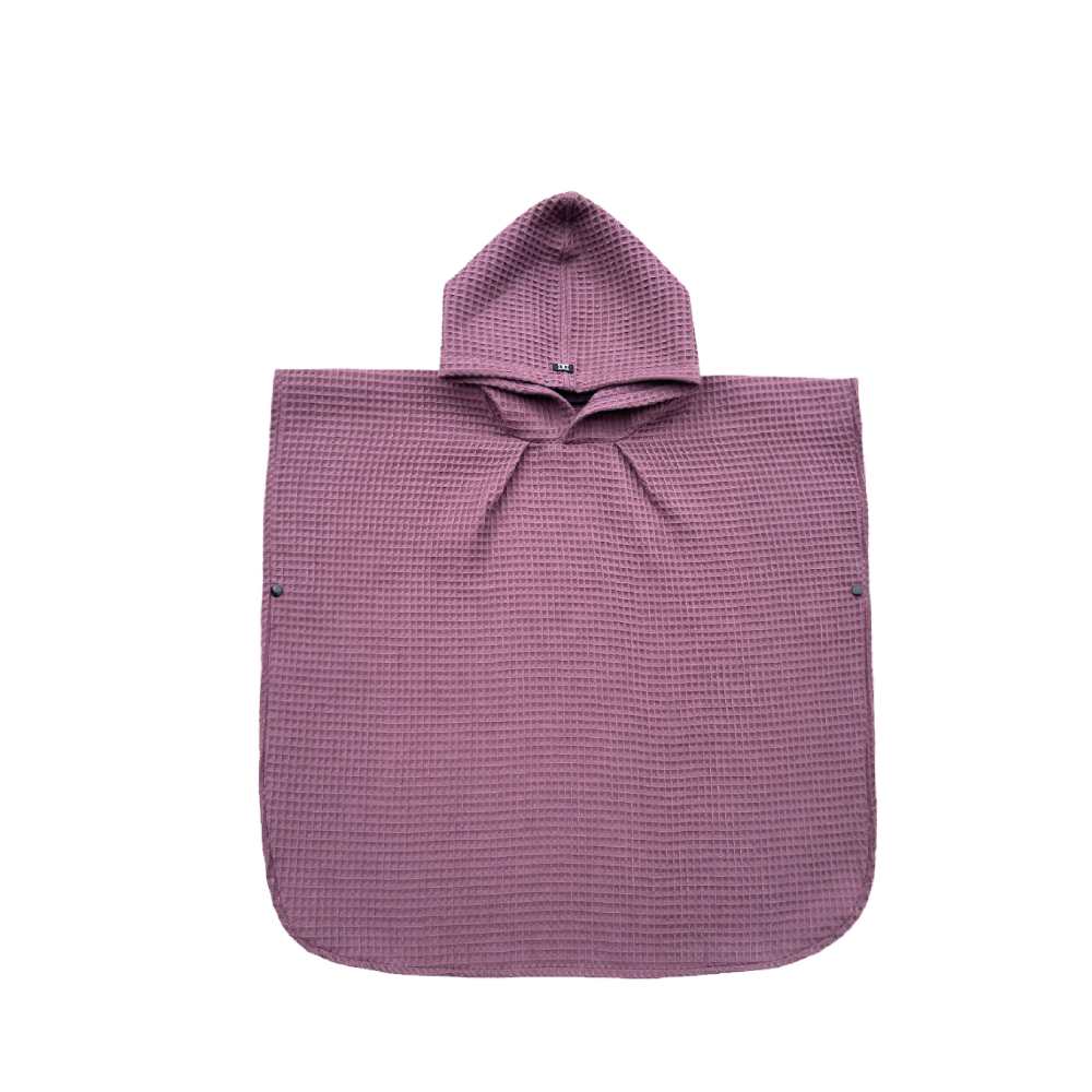 Badeponcho für Kinder in der Farbe Mauve, also Beere aus 100% Baumwolle